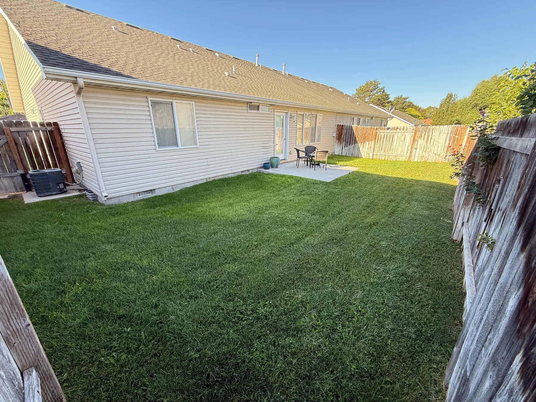 Fenced backyard at Dora Drive Bright Stay